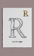 Letter 'R' with a rabbit design on a white background
