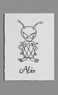 Black line drawing of an alien on white paper with 'Alien' text, against a gray background