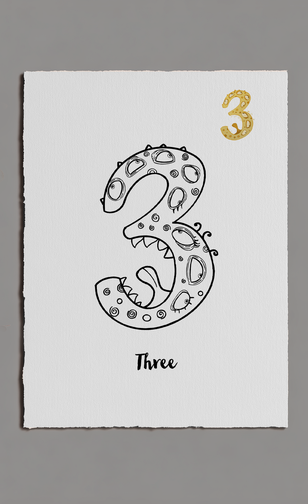 Number three with a decorative design on a white card against a gray background