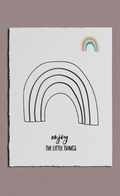Poster with a rainbow design and 'enjoy the little things' text on a white background.