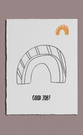 White card with a black rainbow illustration and 'GOOD JOB!' text on a gray background