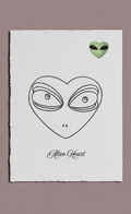 Heart-shaped alien face design with 'Alien Heart' text on a white background