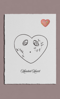 Heart-shaped face with stitched details and a small heart above on a white background